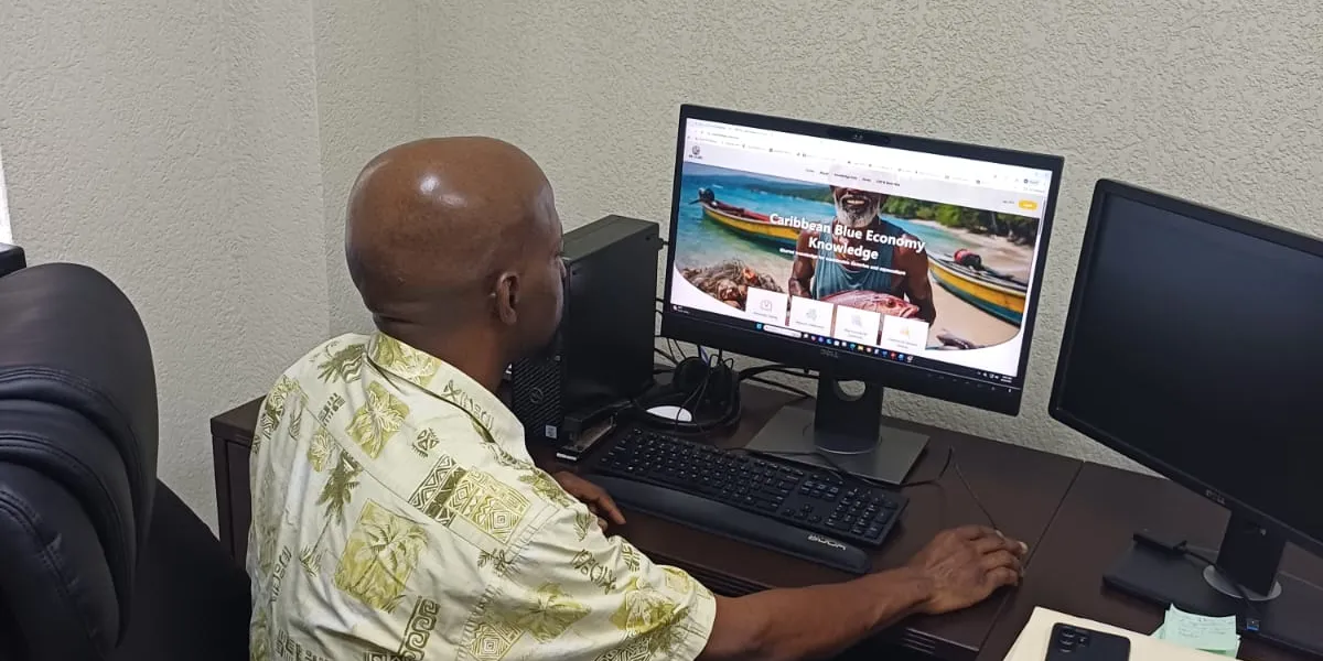 Dr. Marc Williams browses the BE-CLME+ Knowledge Management Hub 
