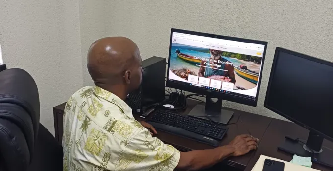 Dr. Marc Williams browses the BE-CLME+ Knowledge Management Hub 