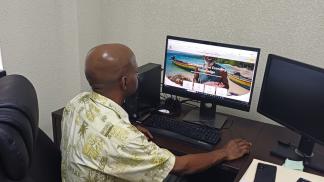 Dr. Marc Williams browses the BE-CLME+ Knowledge Management Hub 